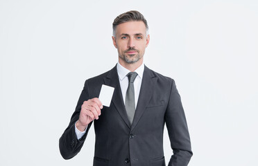 businessman in suit hold business card isolated on white background