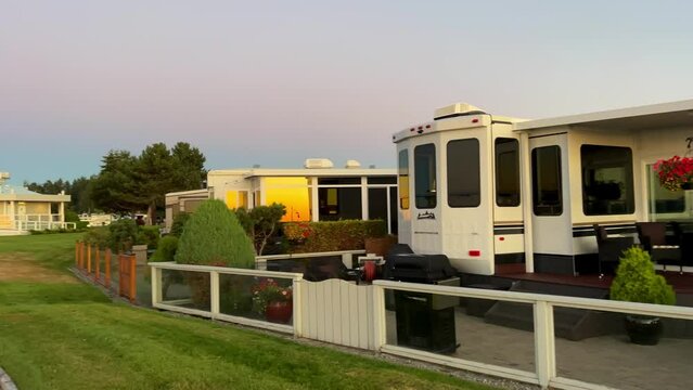 sunset on Ocean Horizon mountains are far visible many clouds and bright colors slow motion video suitable for music relaxation background For text silence peace Parksville beach Surfside RV resort