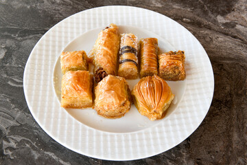 Turkish Dessert Sobiyet  Baklava, mussels baklava and classic baklava with Pistachio . Cevizli, Fistikli Baklava, top view.