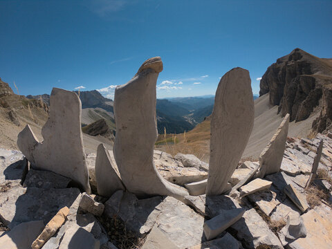 Flat stones stand vertically valley sky amazing mountain and sunny landscape August 2022 | Col de Charnier | D&eacute;voluy | Hautes Alpes | France