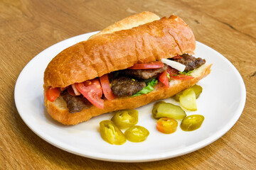 Meatball between bread (Turkish name : ekmek arasi kofte ) Izgara kofte. Manisa, Akcaabat, Akhisar  kofte