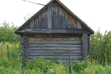 An old wooden log house