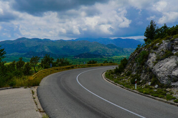 Turning a road in the mountains with a view of the beautiful mountains of southern Croatia