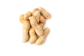 Organic peanuts in shell isolated on white background. Heap of peanut closeup