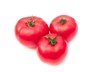 red tomato on white background. Tomatoes collection of whole and sliced isolated on white background. Flat lay, top view. Tasty and healthy food.