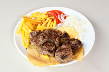 Meatball between bread (Turkish name : ekmek arasi kofte ) Izgara kofte. Manisa, Akcaabat, Akhisar  kofte