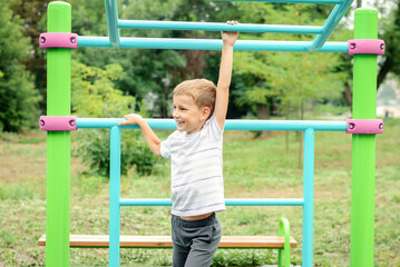 Fototapeta na wymiar little boy on the playground