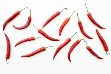 Gordijnen Red chili peppers, isolated on white background © ALEXSTUDIO