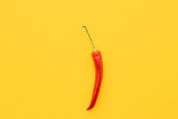Flat lay dried red chili peppers pattern on a yellow color background. Top view, flat lay. - Powered by Adobe
