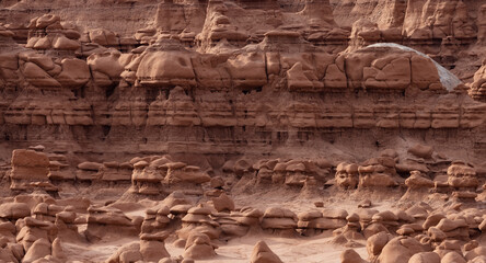 Red Rock Formations and Hoodoos in the Desert at Sunrise. Spring Season. Goblin Valley State Park. Utah, United States. Nature Background.