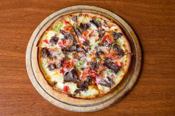 Delicious mixed pizza with rich content. Menu concept of choice and diversity. Karisik pizza