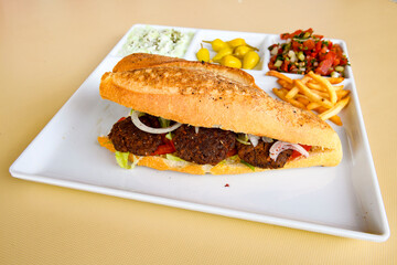 Meatball between bread (Turkish name : ekmek arasi kofte ) Izgara kofte. Manisa, Akcaabat, Akhisar  kofte