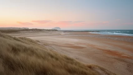 Crédence de cuisine en verre imprimé Cappuccino Seashore and rocky island landscape with lighthouse and sunset sky. Bass Rock, Scotland, United Kingdom