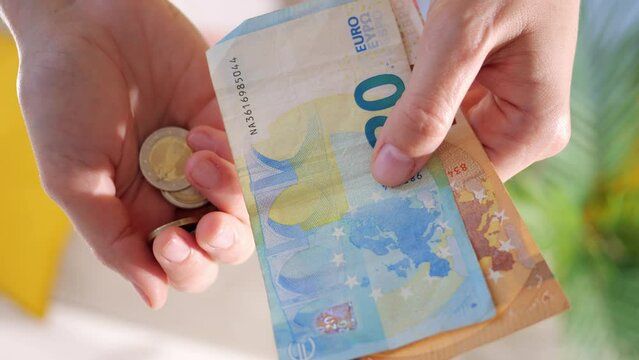 Inflation and hyperinflation financial concept. Property tax and money leverage. falling salaries and purchasing power. poverty and famine. Social security concept. euro banknotes and euro coins.