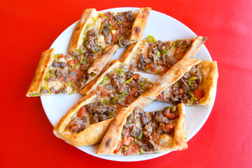 Turkish pita with minced cubed meat and cheese (Turkish name: Kiyma Kusbasi kasarli pide)