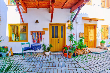 Fototapeta na wymiar Old colored street view with white houses in Kas city, Turkey