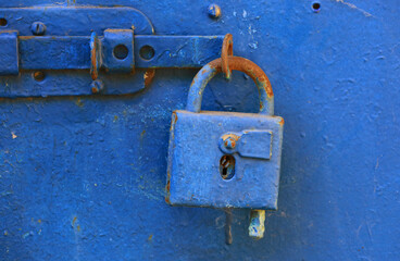 old padlock on door