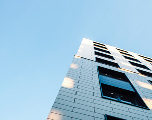 view on new modern buildings, facade corner and sky, real houses on line