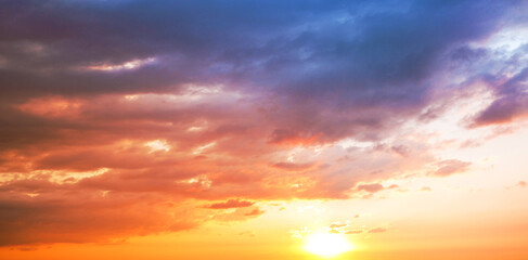 Naklejka na ściany i meble dramatic sunset sky landscape with sun