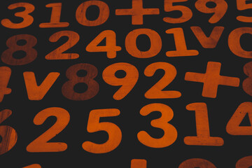Colorful wooden colorful numbers background. Numbers texture abstraction. Global economy crisis...