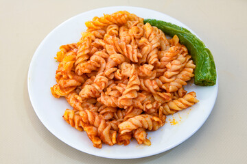 Macaroni Salad with red bell pepper, onion, celery, gherkins and mayonnaise dressing.Traditional Italian pasta with vegetables and creamy cottage cheese in a bowl. Fettuccini, alfredo makarna. 