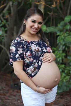 Miami, Florida / United States – December 31, 2021: Maternity Photoshoot in a Park