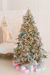 Christmas background, pine branches festive background. Creative composition with border and copy space. Christmas decoration with bokeh lights from light bulbs