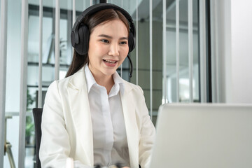 Female call center provides information to a customer calling for help, Contact us, Service with a beautiful and friendly voice, Long distance communication, Talk using headphones or headsets