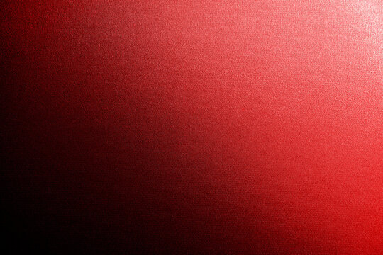 Black red abstract background with a light spot. Gradient. Matte. Background with space for design. Christmas, Valentine. Festive. Web banner. Modern.