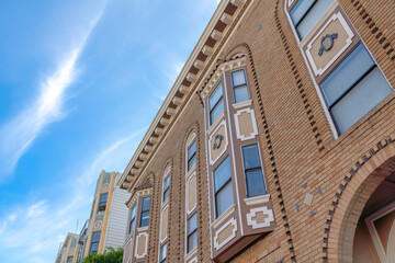 Low angle view of a residential building with georgian style exterior in San Francisco, CA