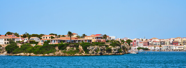 Residential houses on the coast of the island of Menorca, Spain