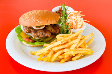 Big tasty  burger with beef cutlet on a plate. Hamburger.