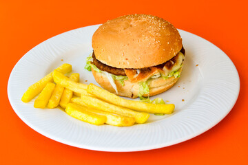 Big tasty  burger with beef cutlet on a plate. Hamburger.