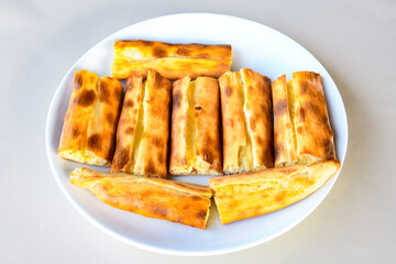 Turkish pita with minced cubed meat and cheese (Turkish name: Kiyma Kusbasi kasarli pide)