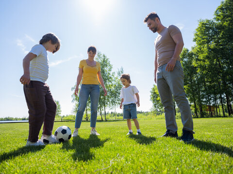 Happy Family Play Soccer