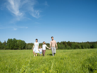 Family Walk In Beautiful Countryside