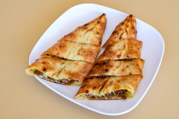 Turkish pita with minced cubed meat and cheese (Turkish name: Kiyma Kusbasi kasarli pide)