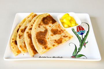 Turkish karisik atom  tost ( kasarli bazlama tost) . Flat baked bread toasted
