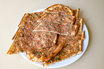 Turkish pita with minced cubed meat and cheese (Turkish name: Kiyma Kusbasi kasarli pide)