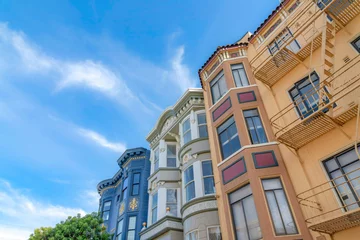 Gordijnen Colorful townhouses with victorian style exterior in San Francisco, California © Jason