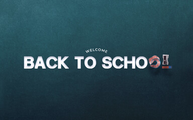 Obraz premium Welcome Back to School Written with Chalk on Blue Blackboard