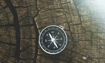 Fototapeta na wymiar Travel and navigation. Determination of cardinal points by compass.