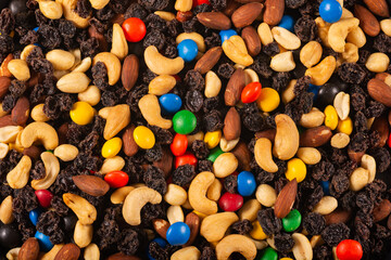 Closeup texture of classic trail mix with cashews, almonds, rais