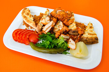 Chicken wings barbeque in a dish with BBQ grill sauce . Izgara tavuk kelebek sis kanat. Tavuk sis, gogus.