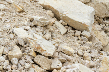 Ruins in a quarry. Dumps of clay and crushed stone in a quarry.