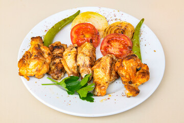 Chicken wings barbeque in a dish with BBQ grill sauce . Izgara tavuk kelebek sis kanat. Tavuk sis, gogus.