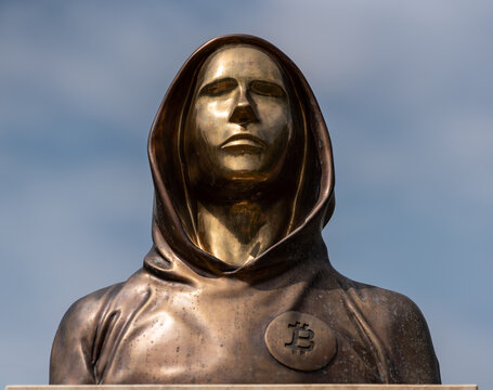 Portrait of the statue of Satoshi Nakamoto mysterious founder of Bitcoin