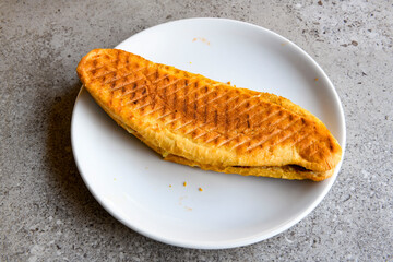 Turkish karisik atom  tost ( kasarli bazlama tost) . Flat baked bread toasted