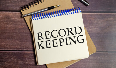 RECORD KEEPING symbol. Concept words Grow positive thoughts on notepad