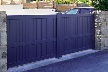 modern high door gray gate blue aluminum home portal with blades suburb house street